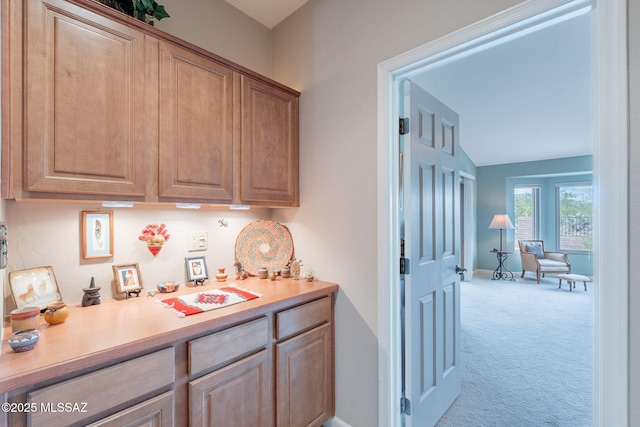 2740 E Ponce Ct, Green Valley, AZ 85614 - bar featuring carpet flooring, lofted ceiling, and baseboards