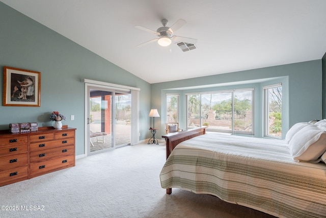 2740 E Ponce Ct, Green Valley, AZ 85614 - bedroom featuring access to exterior, lofted ceiling, carpet, multiple windows, and baseboards