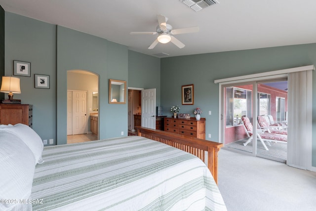 2740 E Ponce Ct, Green Valley, AZ 85614 - bedroom featuring access to outside, light carpet, arched walkways, vaulted ceiling, and a ceiling fan