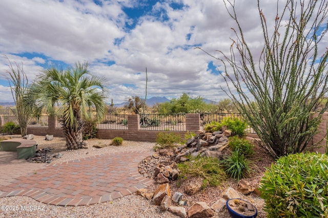 2740 E Ponce Ct, Green Valley, AZ 85614 - view of home's community with fence, a mountain view, and a patio area