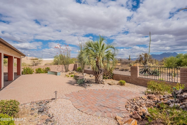 2740 E Ponce Ct, Green Valley, AZ 85614 - view of patio featuring a fenced backyard and a mountain view