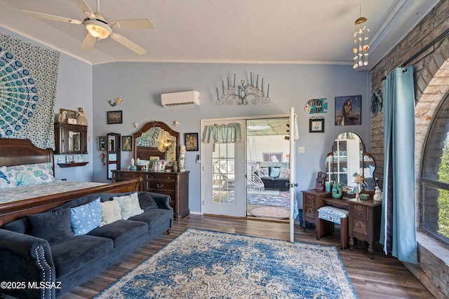 bedroom with ornamental molding, a wall mounted AC, access to outside, and wood finished floors