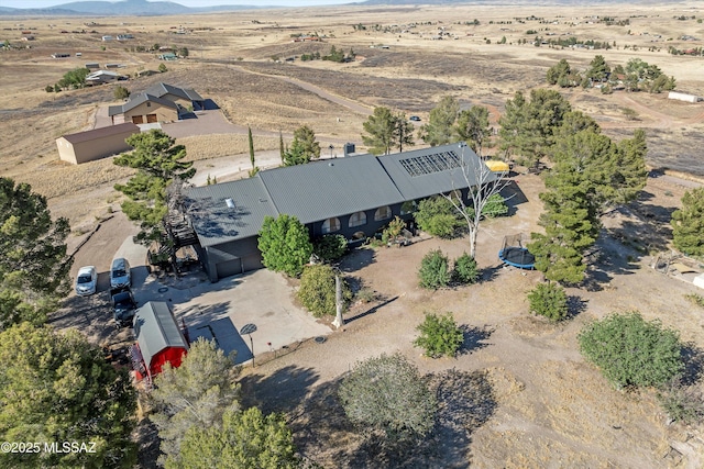 bird's eye view with a rural view, a mountain view, and a desert view