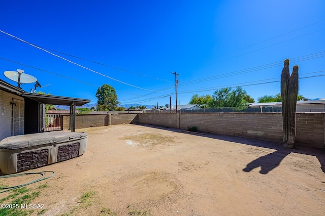 view of yard featuring a fenced backyard