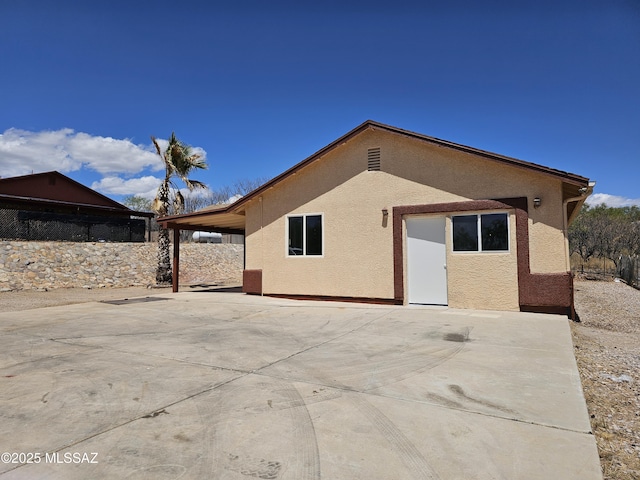 1220-B Circulo Aguilar, Rio Rico, AZ 85648 - back of house featuring a patio area, stucco siding, and fence