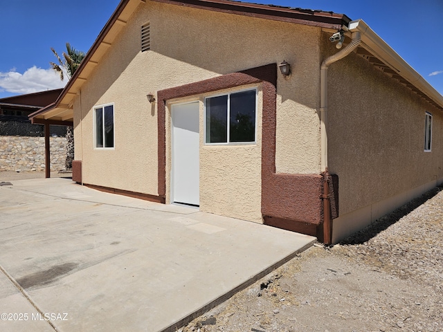 1220-B Circulo Aguilar, Rio Rico, AZ 85648 - back of house with a patio and stucco siding