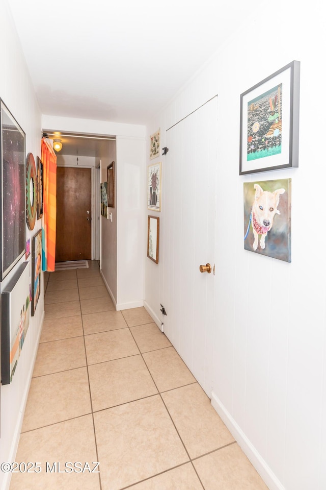 hallway with light tile patterned flooring