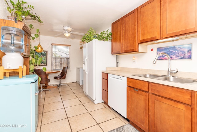 3541 E Cody St, Tucson, AZ 85716 - kitchen featuring white appliances, a sink, light countertops, a ceiling fan, and light tile patterned flooring