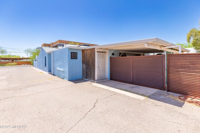 3541 E Cody St, Tucson, AZ 85716 - view of parking with a detached carport