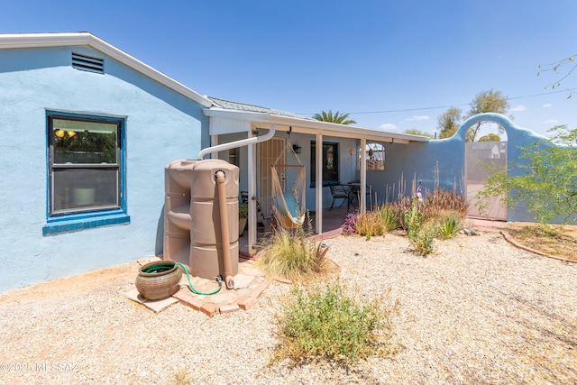 3541 E Cody St, Tucson, AZ 85716 - view of property exterior featuring stucco siding and a patio