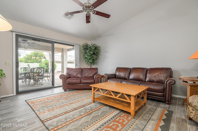 38459 S Bellrock Ct, Tucson, AZ 85739 - living room with ceiling fan, vaulted ceiling, wood finished floors, and baseboards