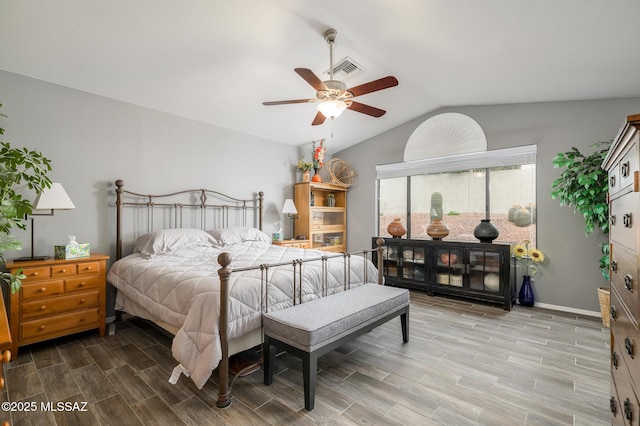 38459 S Bellrock Ct, Tucson, AZ 85739 - bedroom featuring wood finished floors, vaulted ceiling, and ceiling fan