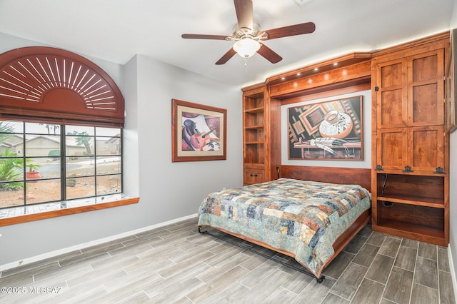 38459 S Bellrock Ct, Tucson, AZ 85739 - bedroom with wood finished floors and baseboards