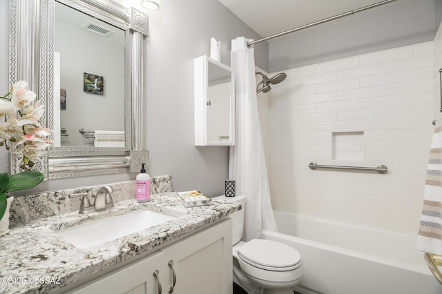 38459 S Bellrock Ct, Tucson, AZ 85739 - full bathroom with toilet, shower / bath combination with curtain, and vanity