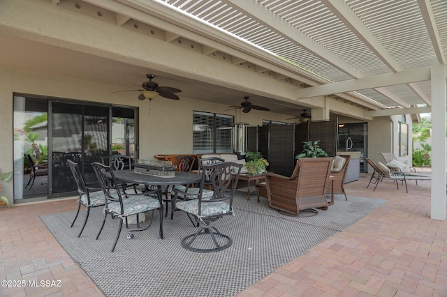 38459 S Bellrock Ct, Tucson, AZ 85739 - view of patio featuring ceiling fan, outdoor dining area, and a pergola