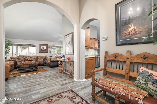 38459 S Bellrock Ct, Tucson, AZ 85739 - living room featuring light wood-type flooring and arched walkways
