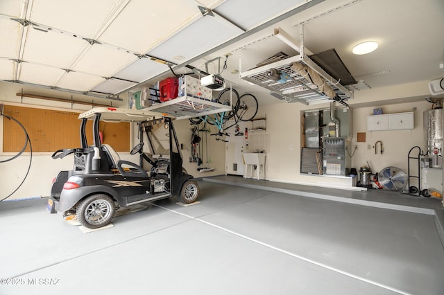 38459 S Bellrock Ct, Tucson, AZ 85739 - garage with a garage door opener and a sink