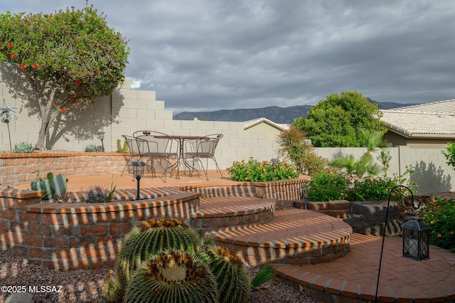 38459 S Bellrock Ct, Tucson, AZ 85739 - view of patio featuring a fenced backyard and a mountain view