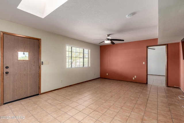 895 W Roller Coaster Rd, Tucson, AZ 85704 - foyer featuring a ceiling fan and light tile patterned floors