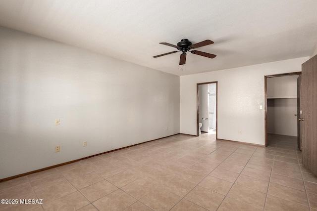 895 W Roller Coaster Rd, Tucson, AZ 85704 - empty room with a ceiling fan and light tile patterned flooring
