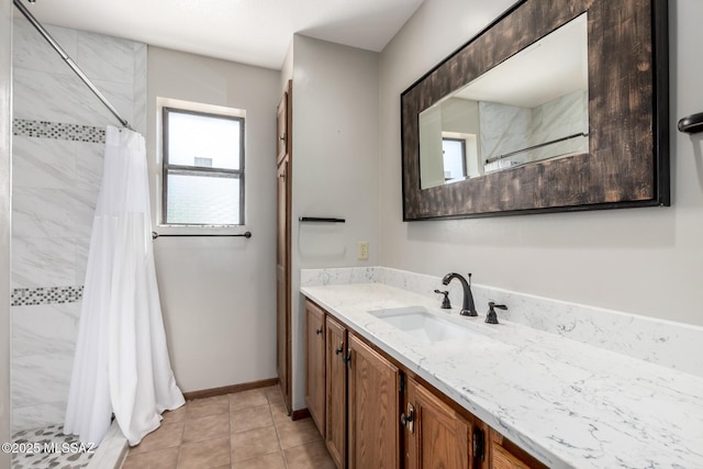 895 W Roller Coaster Rd, Tucson, AZ 85704 - bathroom featuring vanity, a tile shower, and tile patterned floors