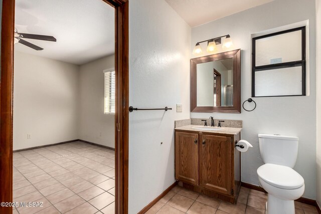 895 W Roller Coaster Rd, Tucson, AZ 85704 - bathroom featuring tile patterned flooring, vanity, and a ceiling fan