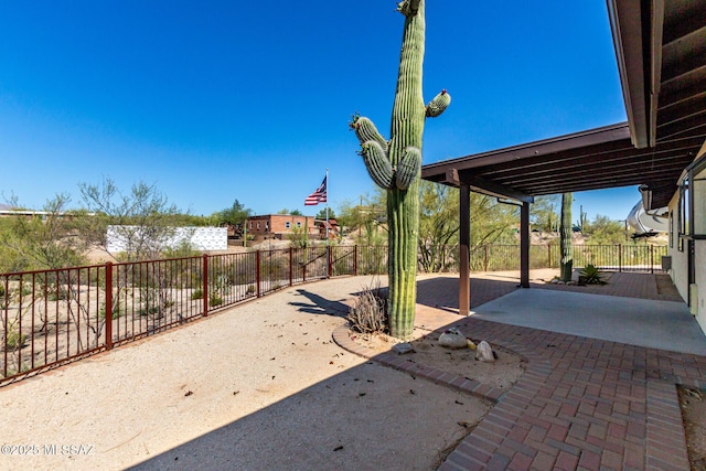 895 W Roller Coaster Rd, Tucson, AZ 85704 - fenced backyard with a patio
