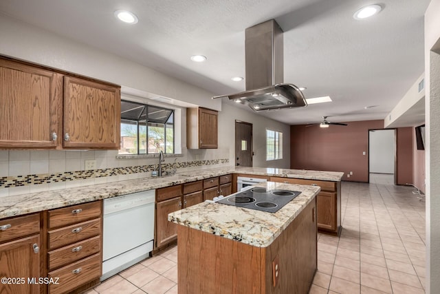 895 W Roller Coaster Rd, Tucson, AZ 85704 - kitchen with white dishwasher, island exhaust hood, black electric stovetop, a peninsula, and brown cabinets