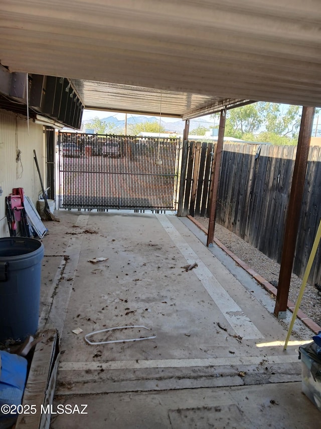 view of patio featuring fence