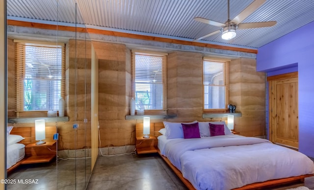 bedroom with concrete floors