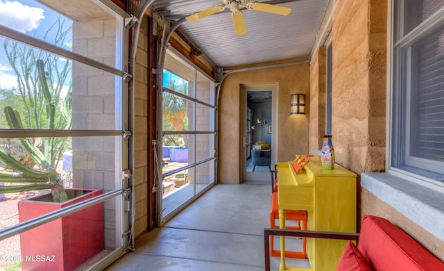 interior space with a ceiling fan