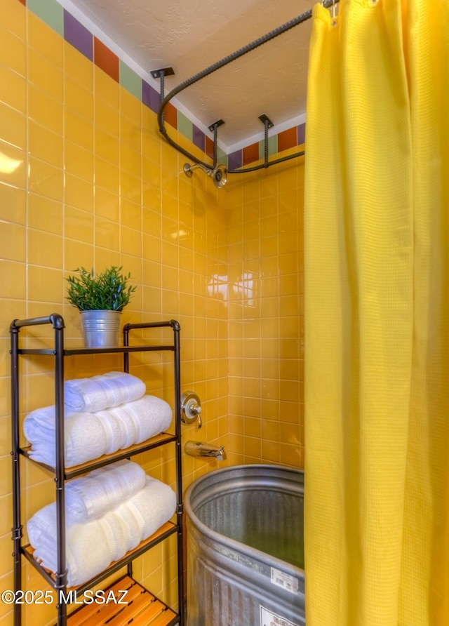 interior space featuring a shower with curtain