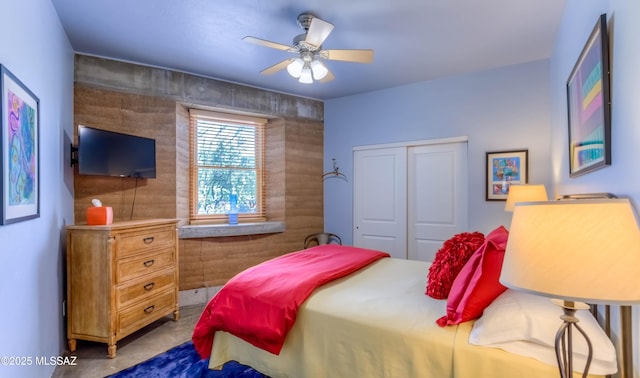 bedroom featuring a closet and a ceiling fan