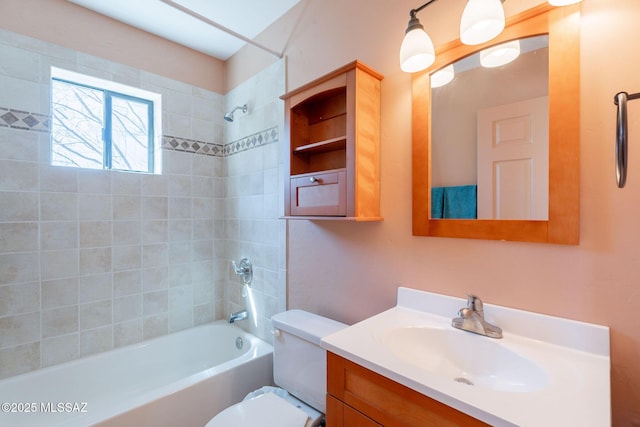 full bath featuring shower / bath combination, vanity, and toilet