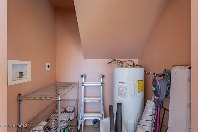 utility room with electric water heater