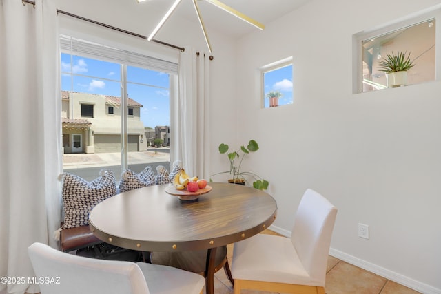 29 W Camino Rancho Viejo, Sahuarita, AZ 85629 - tiled dining space featuring baseboards