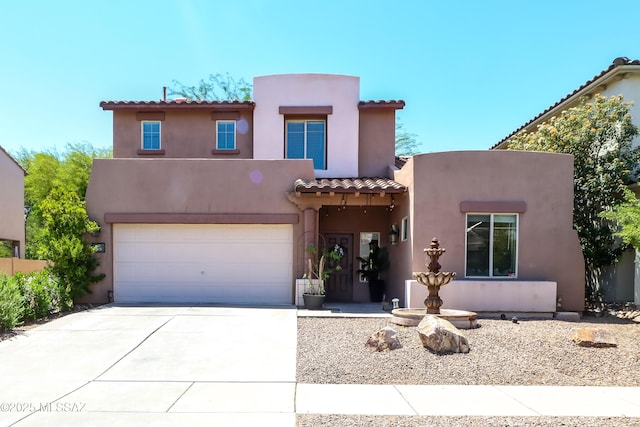 29 W Camino Rancho Viejo, Sahuarita, AZ 85629 - view of front of home with a tiled roof, concrete driveway, stucco siding, and a garage