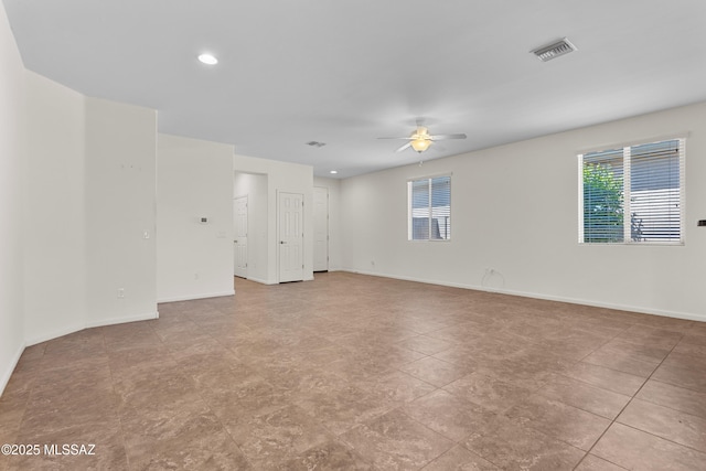 11413 E Squash Blossom Loop, Tucson, AZ 85747 - empty room with ceiling fan, baseboards, and recessed lighting