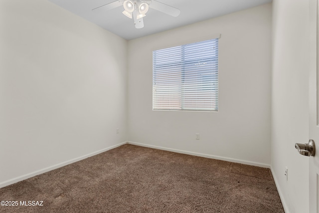 11413 E Squash Blossom Loop, Tucson, AZ 85747 - carpeted empty room with a ceiling fan and baseboards