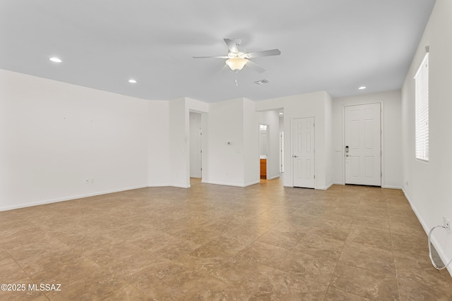 11413 E Squash Blossom Loop, Tucson, AZ 85747 - spare room with ceiling fan, recessed lighting, and baseboards