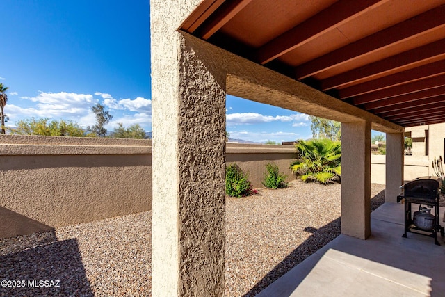 view of patio / terrace with a grill and a fenced backyard
