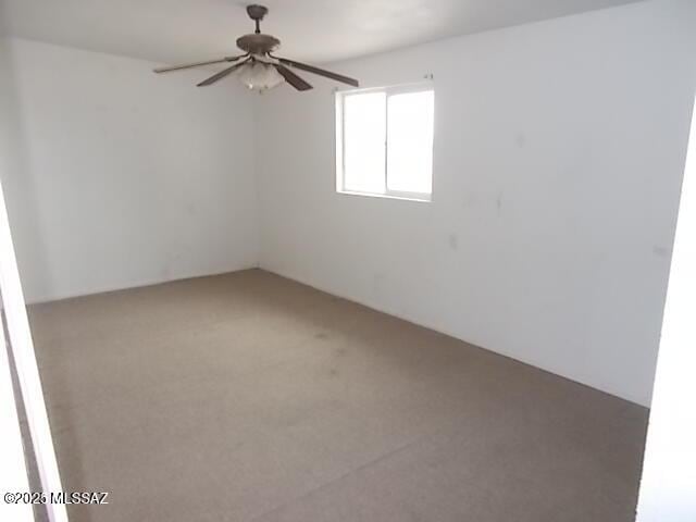2491 N Joe Hines Rd, Willcox, AZ 85643 - carpeted spare room featuring ceiling fan