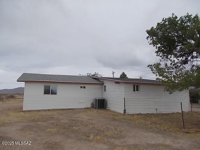 2491 N Joe Hines Rd, Willcox, AZ 85643 - rear view of property featuring central AC