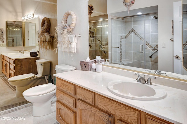 full bath with tile patterned flooring, toilet, a shower stall, and vanity