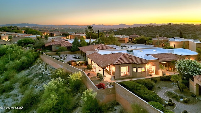 aerial view with a mountain view and a residential view