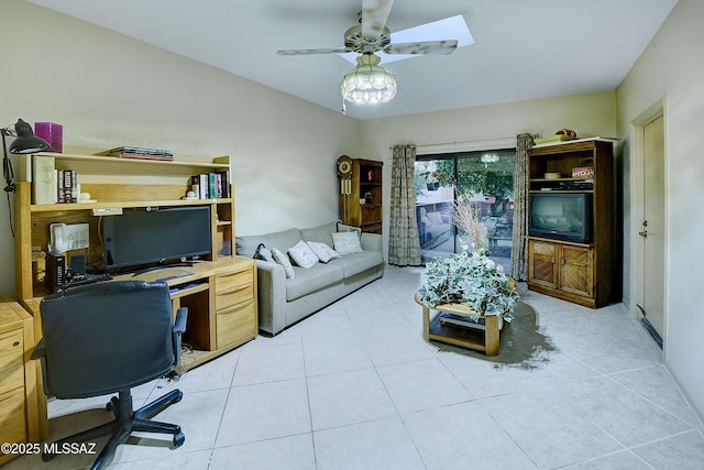 office space featuring light tile patterned floors and ceiling fan