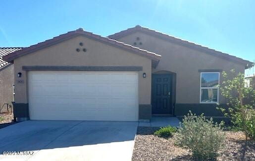 365 S Redwood Loop, Benson, AZ 85602 - ranch-style house with an attached garage, stucco siding, driveway, and a tiled roof