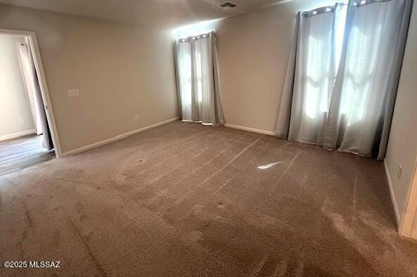 365 S Redwood Loop, Benson, AZ 85602 - unfurnished room with carpet floors and baseboards