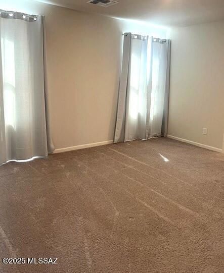 365 S Redwood Loop, Benson, AZ 85602 - carpeted spare room featuring baseboards