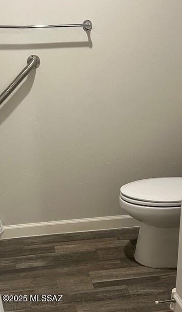 365 S Redwood Loop, Benson, AZ 85602 - bathroom with wood finished floors, baseboards, and toilet